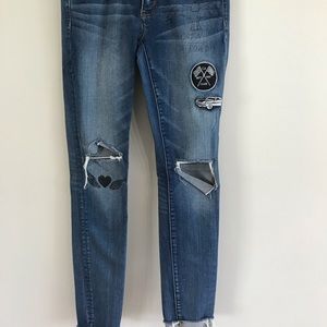 Patched ankle cropped jeans